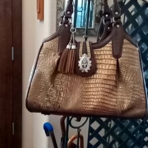 Madi Claire Leather Handbag in gold.